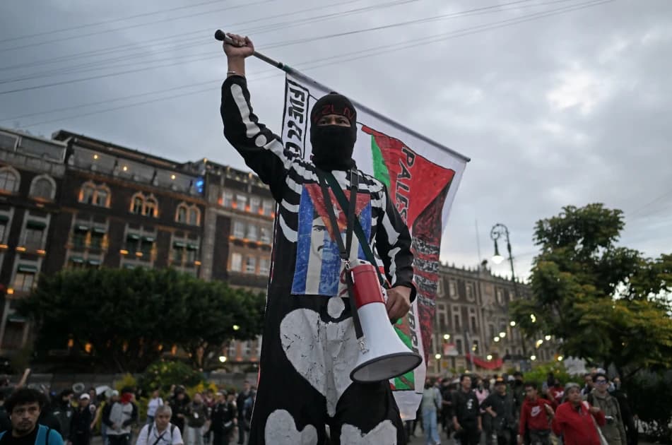 Thousands protest ahead of Mexican president's report on missing students