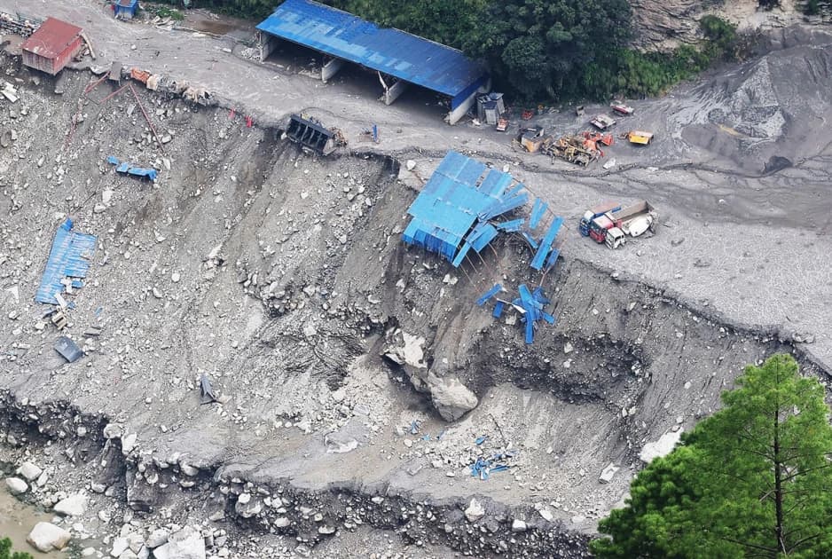 In Nepal's flood zone, teachers mourn students who never returned