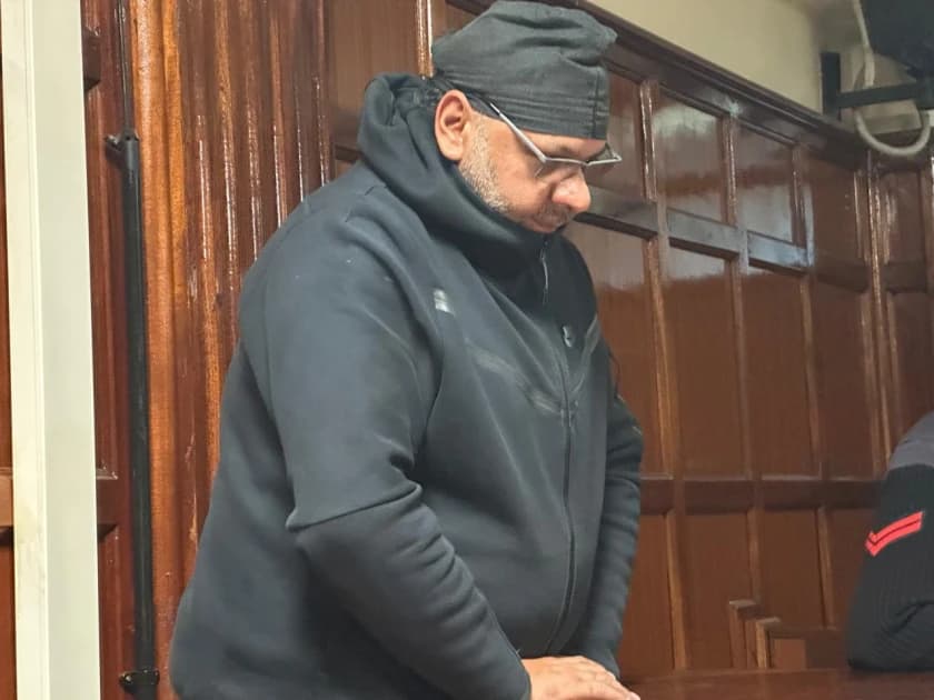 Businessman charged over alleged false documents