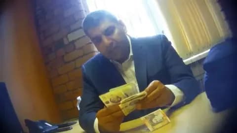 Lawyer caught offering to make illegal-worker fine go away
