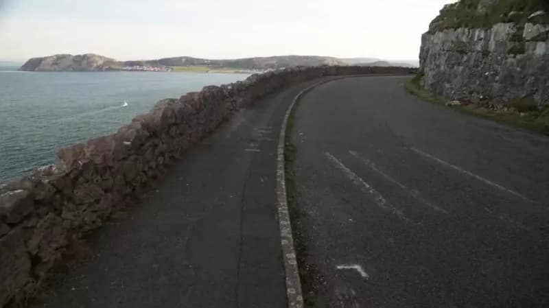 Motorcyclist dies after falling into sea in cliffside beauty spot crash