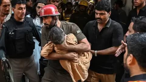 At least 33 pupils and teacher killed after school roof collapses in Pakistan