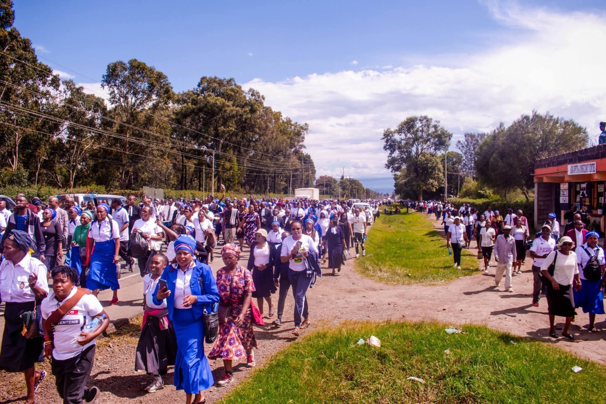 Church members, community hold peaceful procession to condemn killing