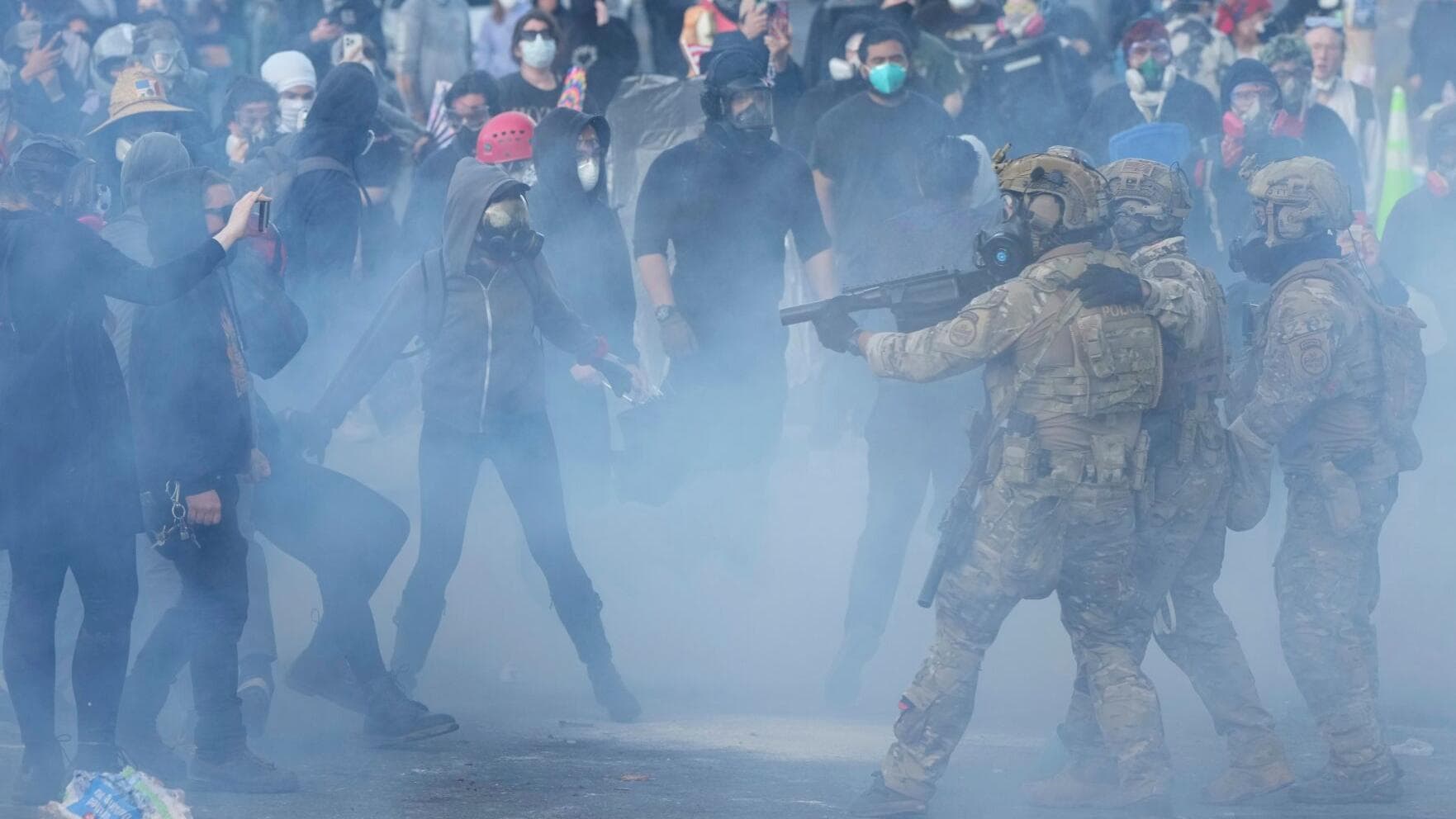 Eight sentenced to 450 years in prison over anti-ICE riot where officer was shot