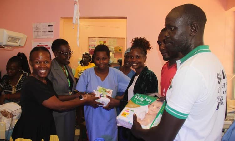Busia journalists mark Press Day with charity hospital visit