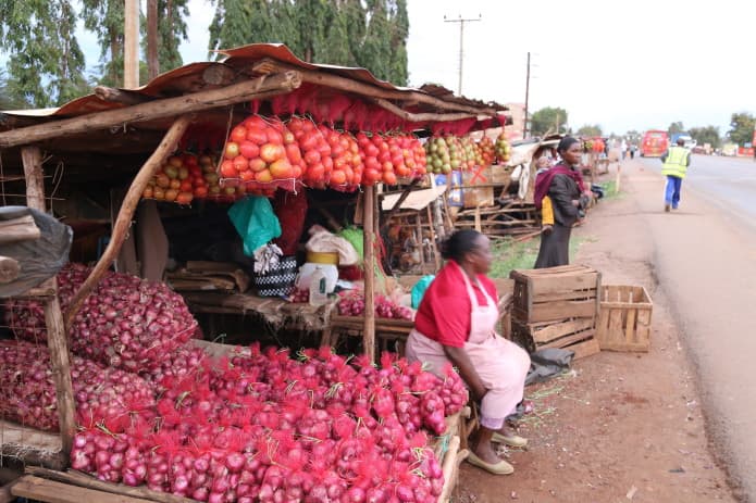 Farmer reports prices twice as high besides highways than through middlemen