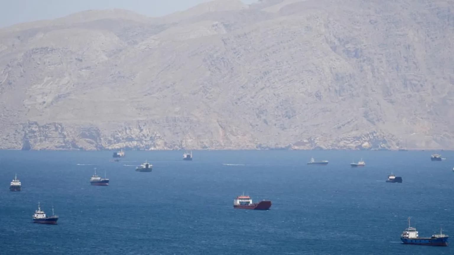 US threatens shipping firms with sanctions if they pay Iran tolls