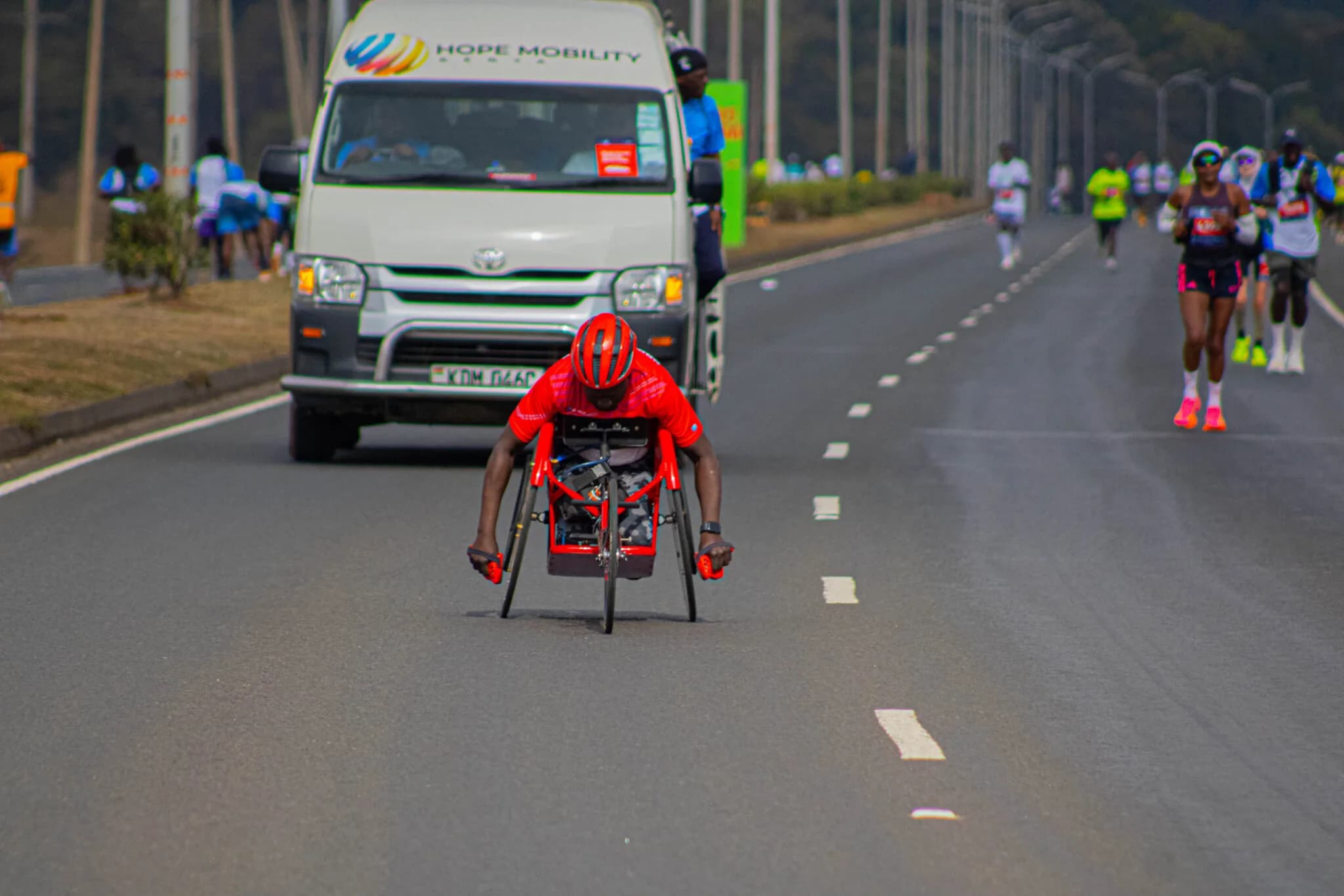 South Sudan-born paraplegic raises millions in historic race at StanChart Marathon