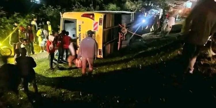 School Bus Ferrying Students to Music Festival Overturns