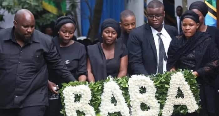 Magufuli’s Children Laying Wreath at Father’s Grave