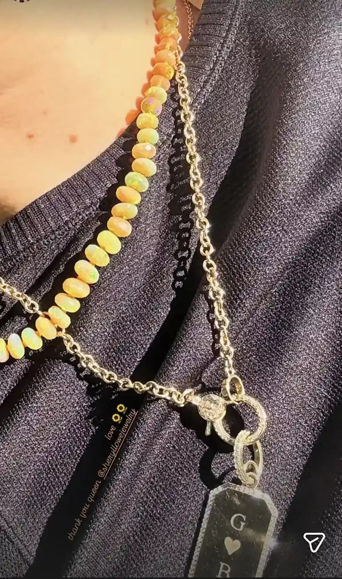 Gigi Hadid Sparks Buzz with Gold “Love” Pendant Honoring Bradley Cooper