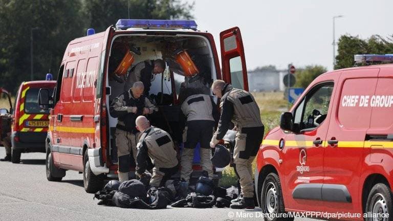 Man found shot dead in UK van transporting migrants in France