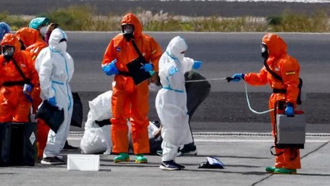 Spain starts evacuating virus-hit cruise ship in Tenerife
