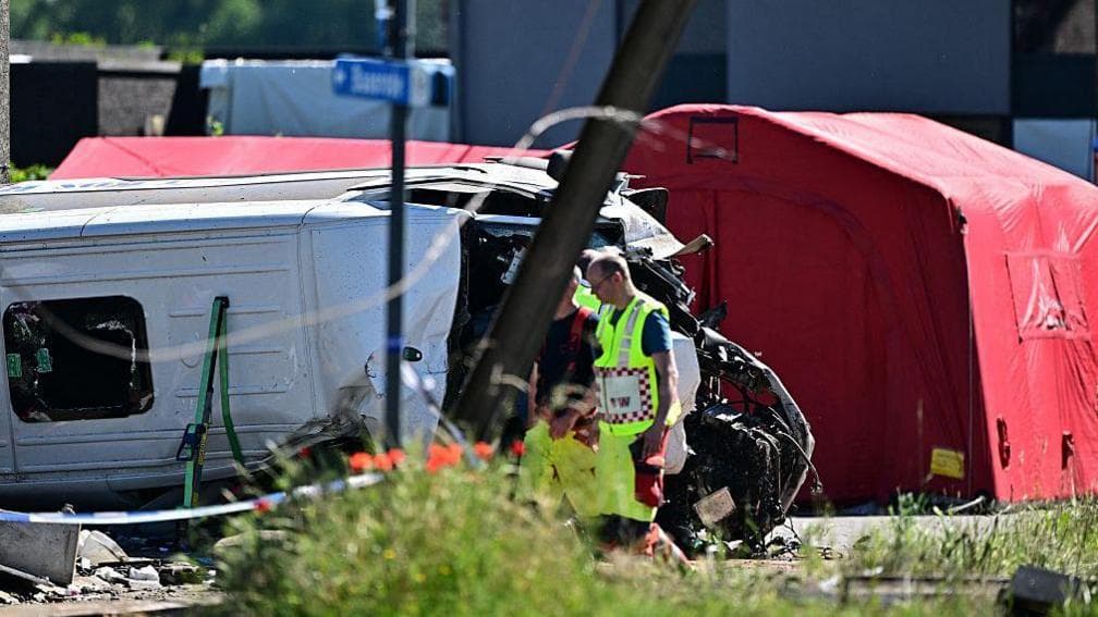 Four killed as school minibus collides with train in Belgium