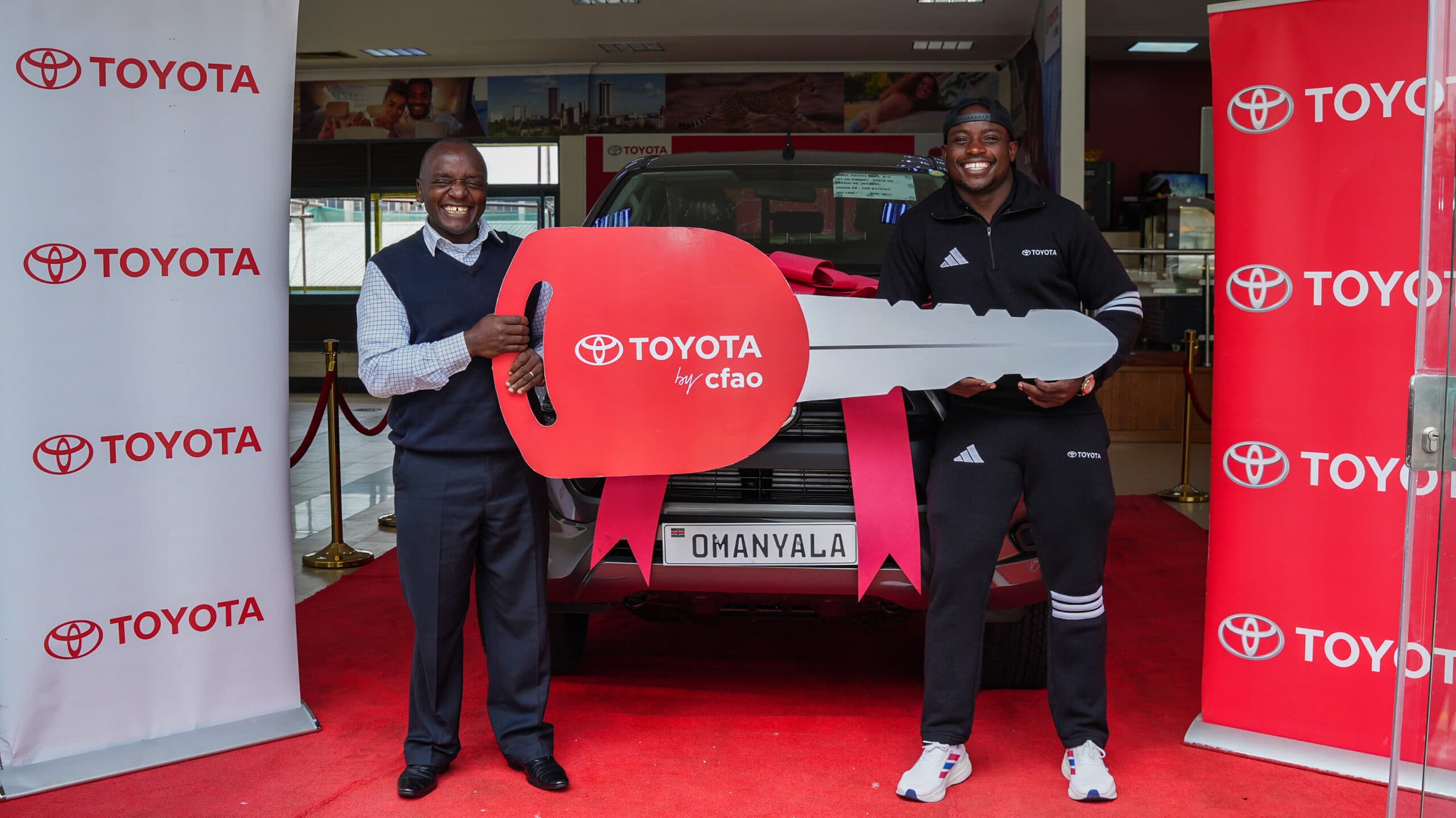 Toyota by CFAO Kenya gifts Ferdinand Omanyala the 2025 Toyota Hilux Double Cab