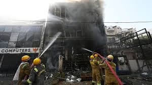 Inquiry ordered after building fire kills 15 in north India city