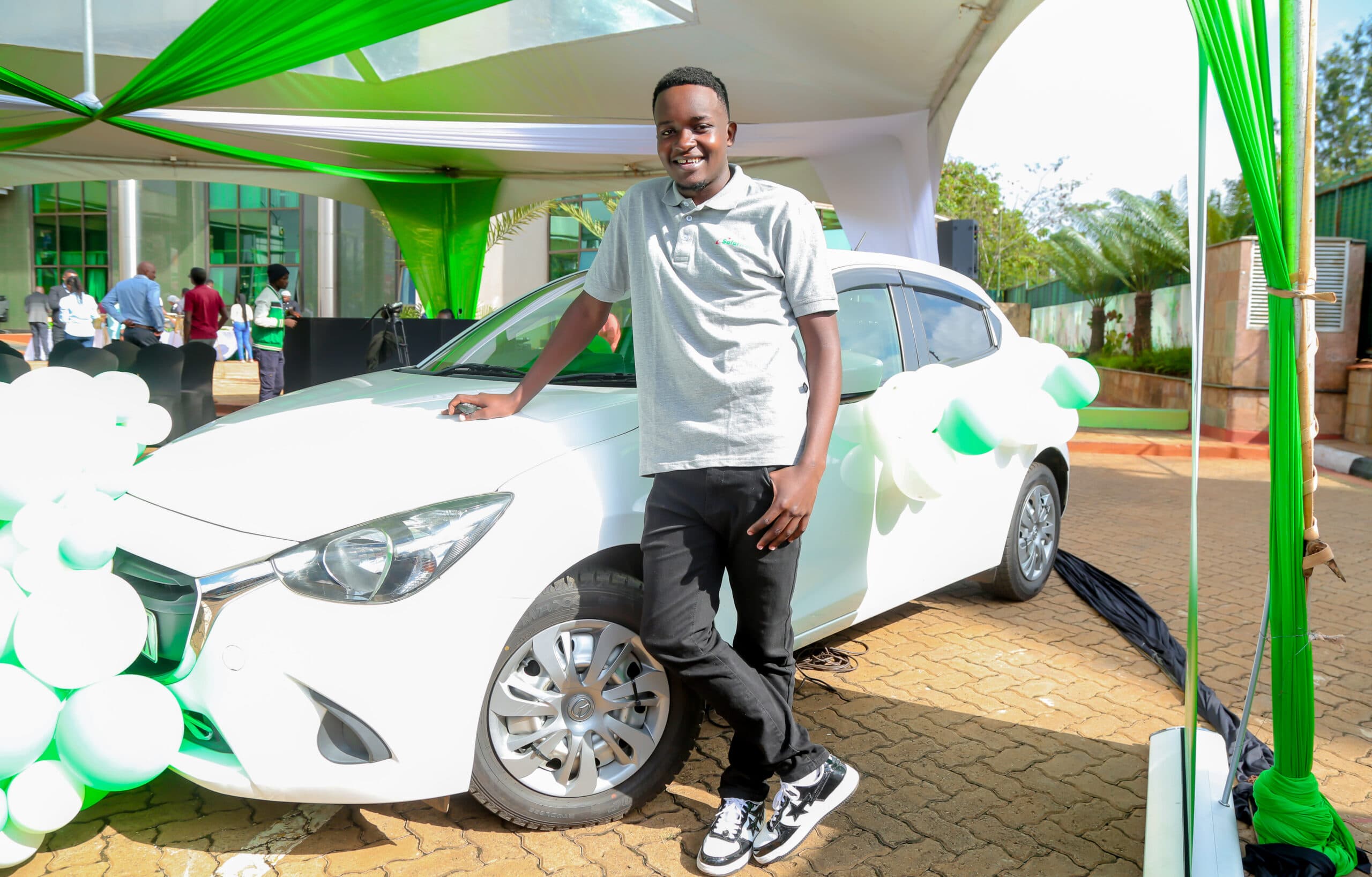 Al Mitaki Onchiri wins grand prize in the Safaricom Win a Car gaming challenge