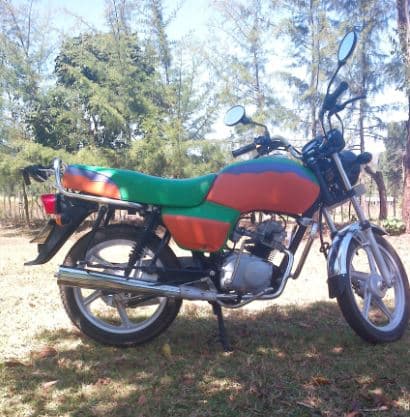 Farmer buys motorbike from groundnut farming savings