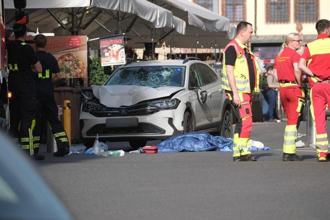 Two killed and many injured after car driven into crowd in German city of Leipzig