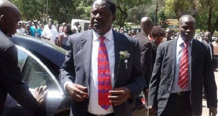 Drama As Raila’s Bodyguard Blocked From VIP Stand at Kibaki’s Funeral