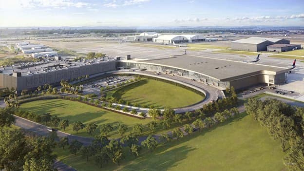 When will the Mobile International Airport be completed?