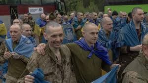 Prisoner swap goes ahead as Kyiv mourns 24 killed in Russian strike on flats