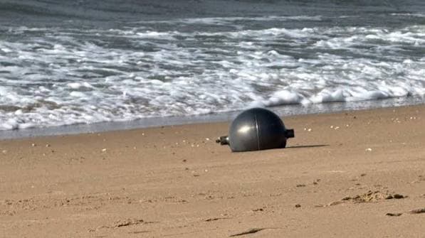Australia probes mystery space balls that washed up on beach